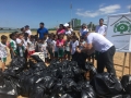 No Dia Mundial da Água, ação do PEV recolheu cerca de 30 sacos de lixo, realizou peixamento e abraçou o Rio S. Francisco. (22.03).